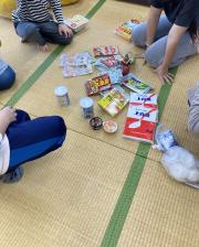 子ども食堂での寄付の様子.jpeg