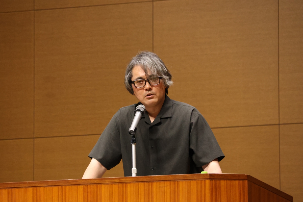 講演を行う武田氏